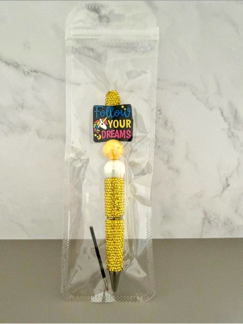 ✨ Sparkling Yellow Rhinestone pen “Follow Your Dreams” yellow and white beads.